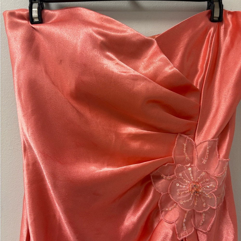 Jessica McClintock Asymmetrical Coral Dress with Floral Accent - Picture 3 of 10